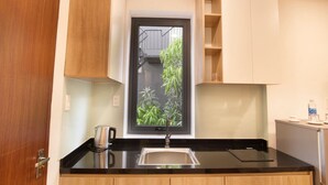 Fridge, stovetop, cookware/dishes/utensils, paper towels - Joey Apartment (Da Nang)