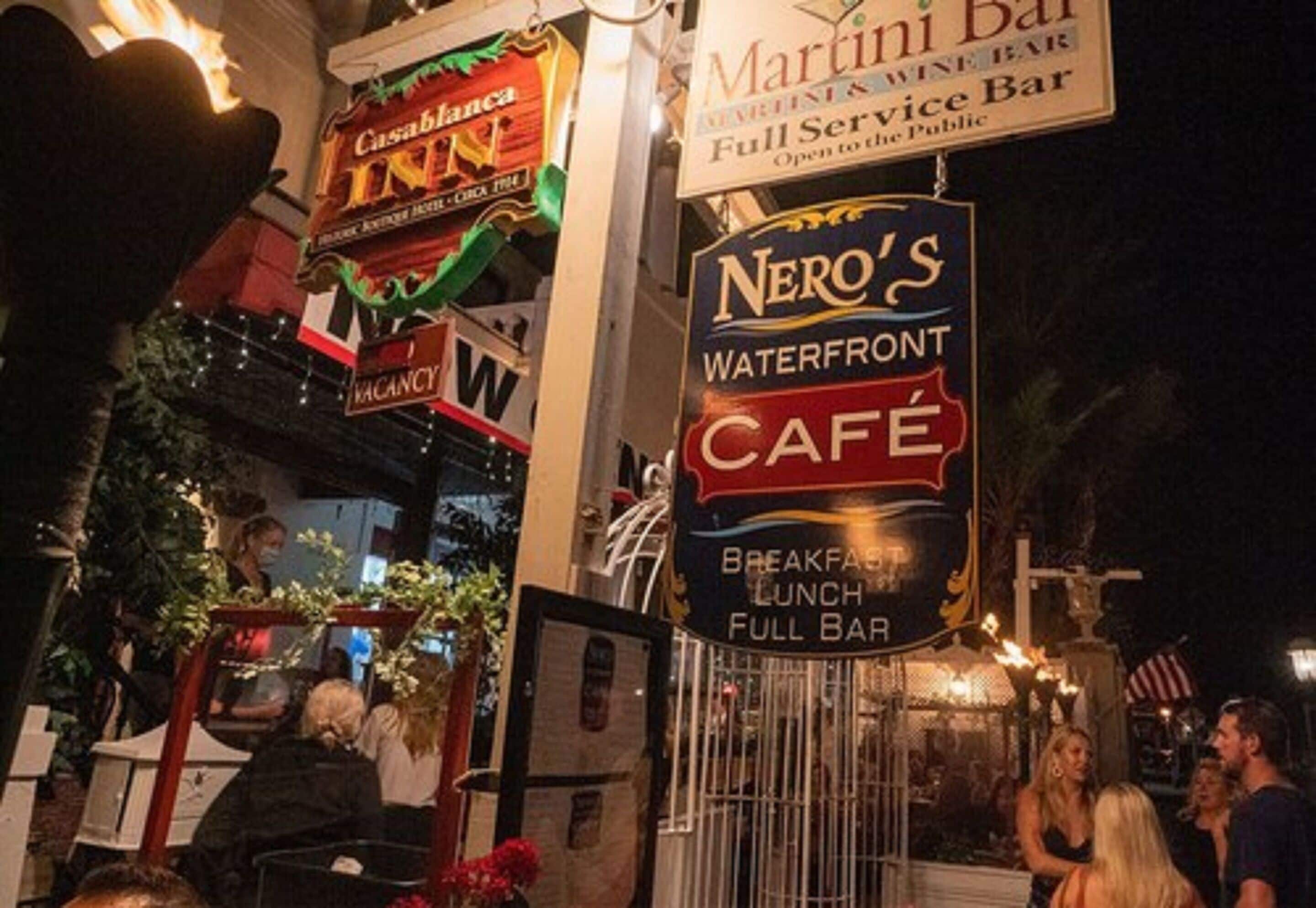 Signs for 'Casablanca Inn' and 'Nero's Waterfront Café' with 'Full Service Bar' and 'Breakfast, Lunch, Full Bar' mentioned.