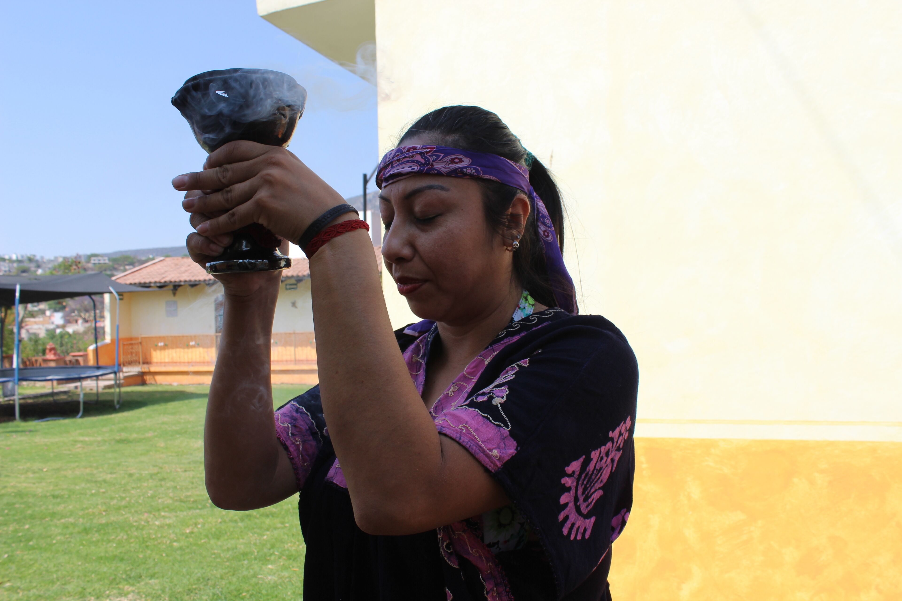 A person holding a trophy.