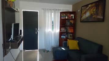 Apartamento executivo, 2 camas de casal (Duplo) | Área de estar | TV de tela plana