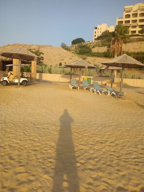 Sun-loungers, beach towels