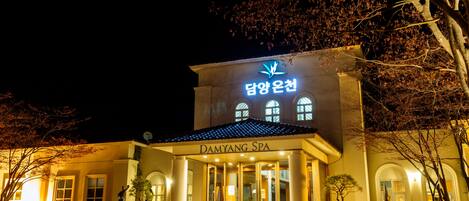 A building with a sign reading "Damyang Spa".