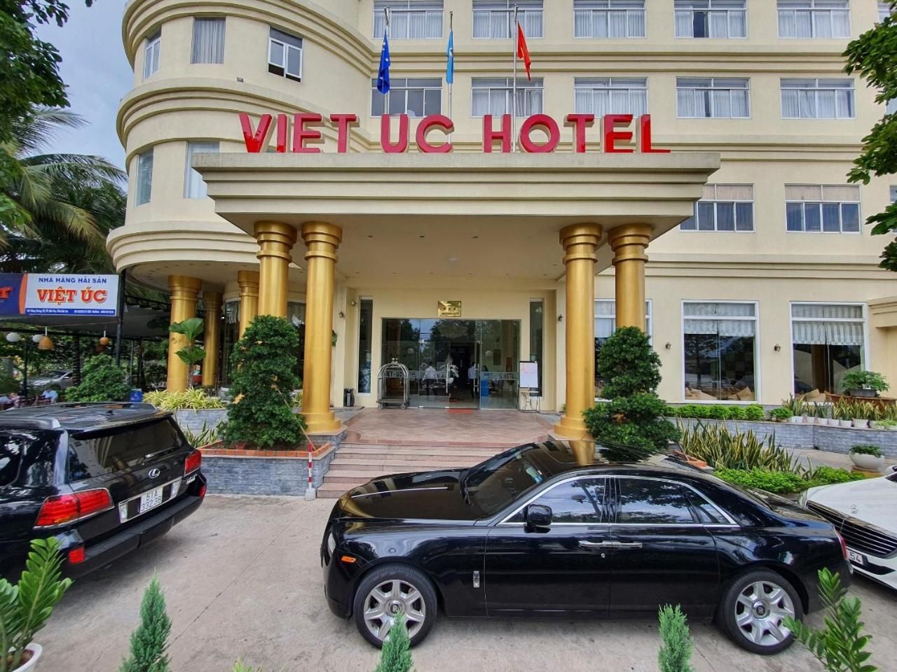 A hotel entrance with a sign reading 'VIET UC HOTEL'.