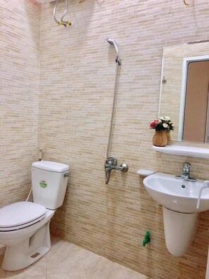 Shower, free toiletries, hair dryer, slippers