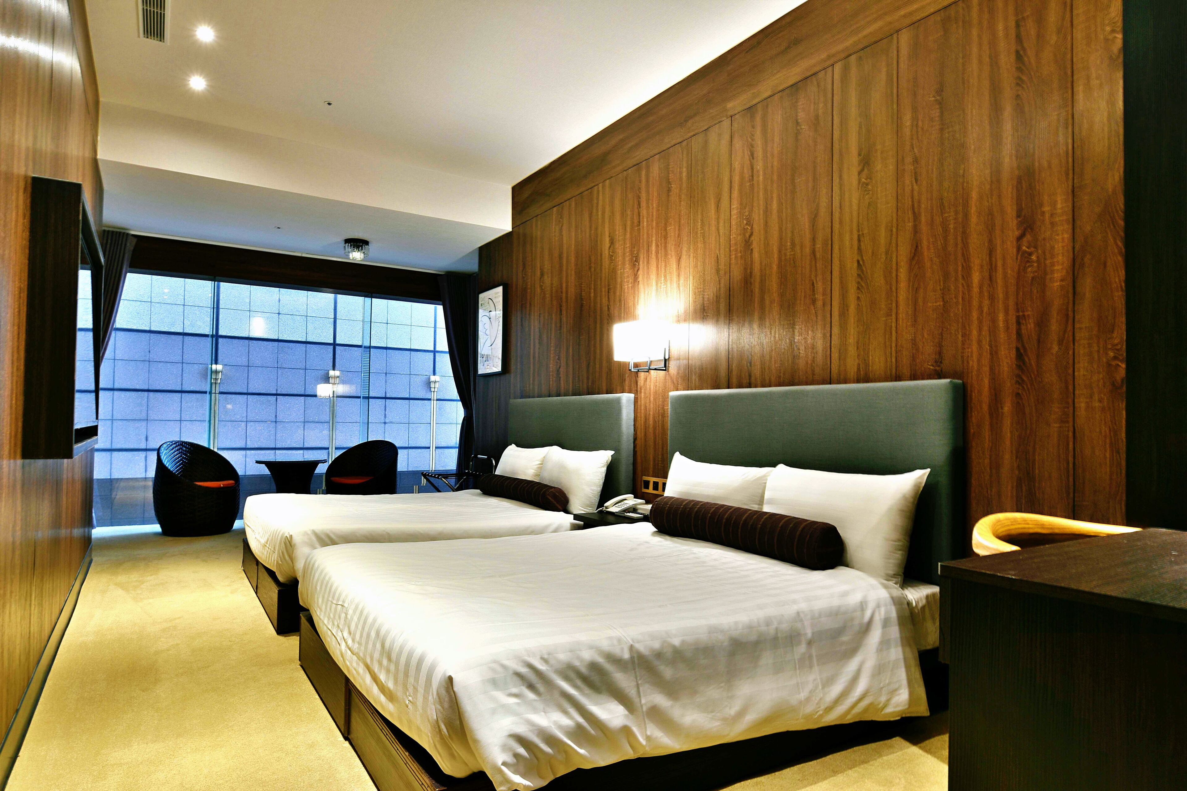 deluxe quadruple room (with window) | 1 bedroom, free minibar, in-room safe, soundproofing