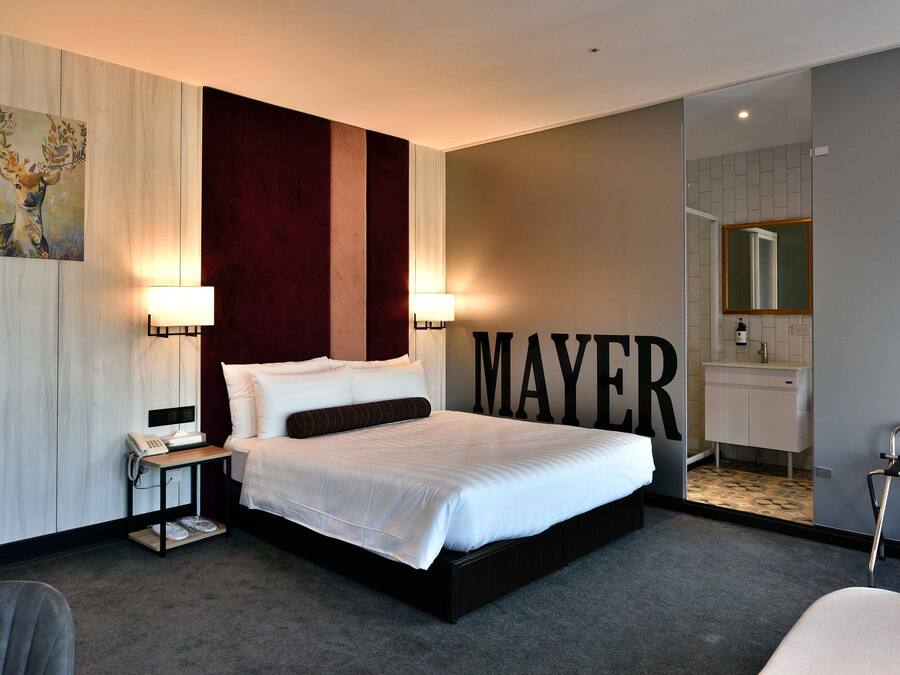 Double Room, City View | Free minibar, in-room safe, soundproofing, iron/ironing board