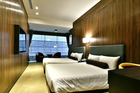 Deluxe Quadruple Room (with window) | Free minibar, in-room safe, soundproofing, iron/ironing board