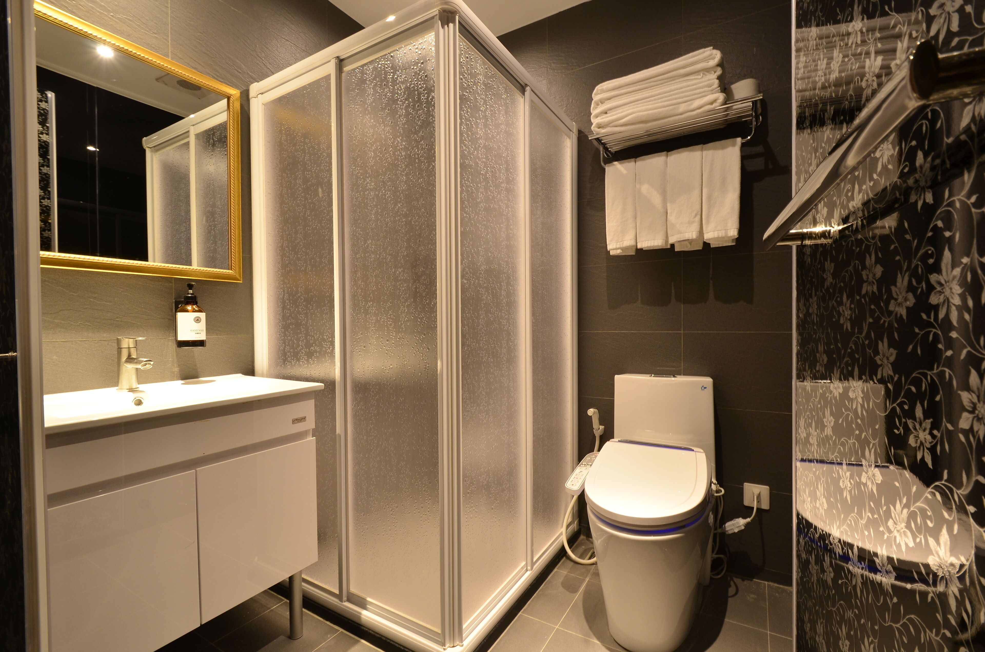 shower, hair dryer, slippers, bidet