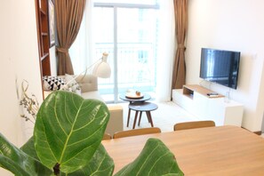 40-inch flat-screen TV with cable channels, TV