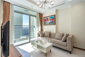 Premium Apartment, 2 Bedrooms | Living room | 40-inch flat-screen TV with cable channels, TV