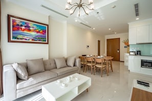 Premium Apartment, 2 Bedrooms | Living room | 40-inch flat-screen TV with cable channels, TV