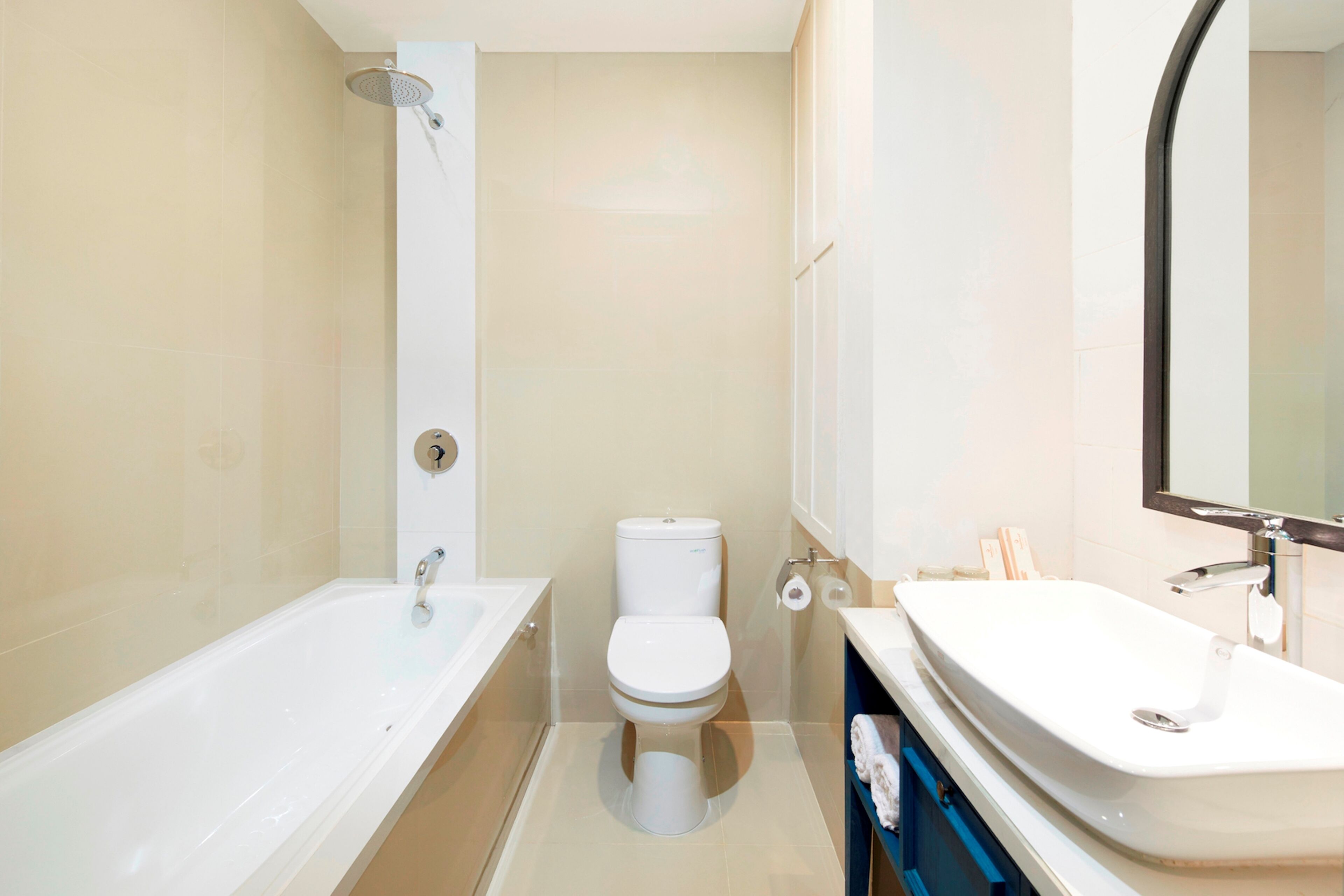 executive suite | bathroom | hair dryer, slippers, towels, soap