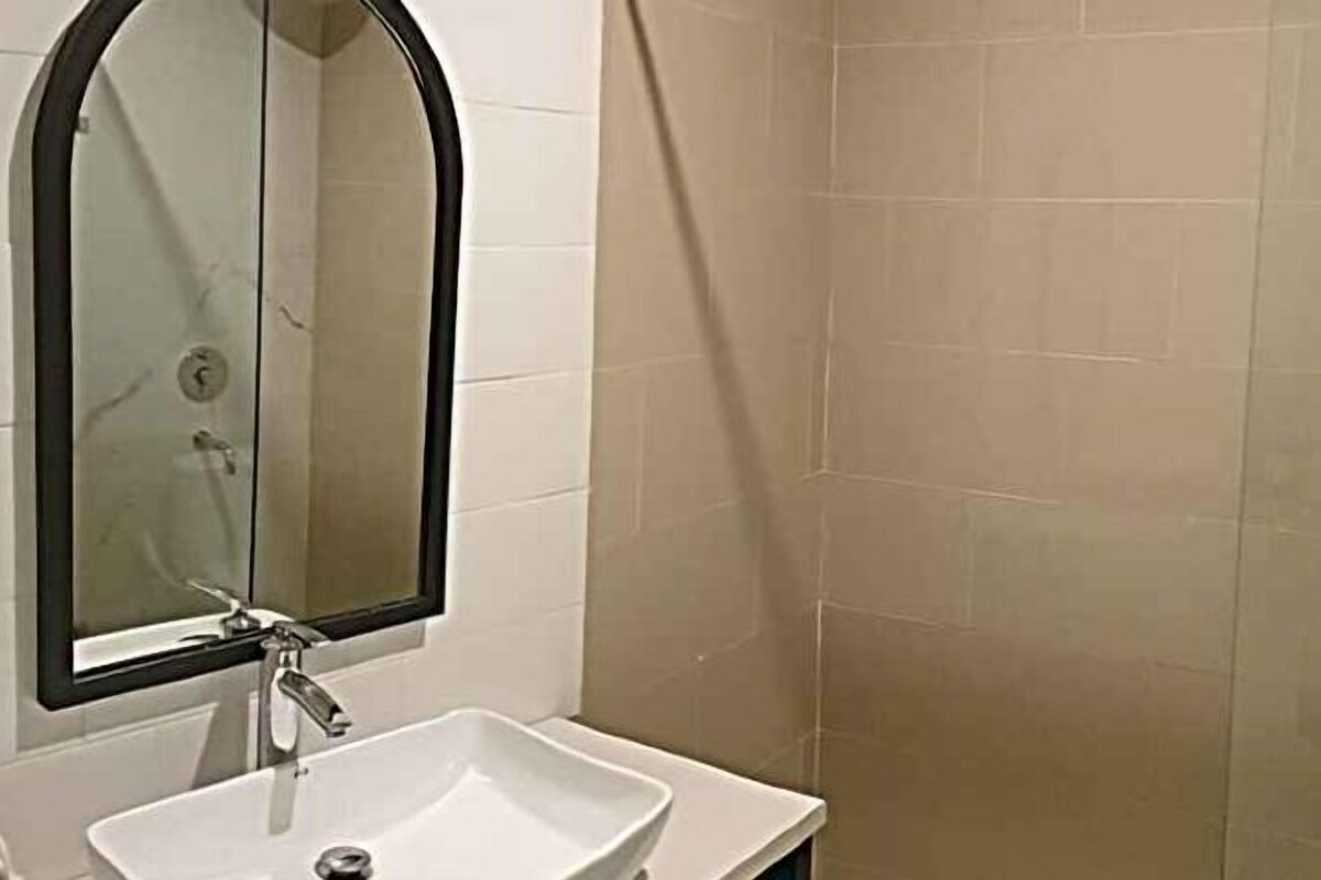 Bathroom | Hair dryer, slippers, towels, soap