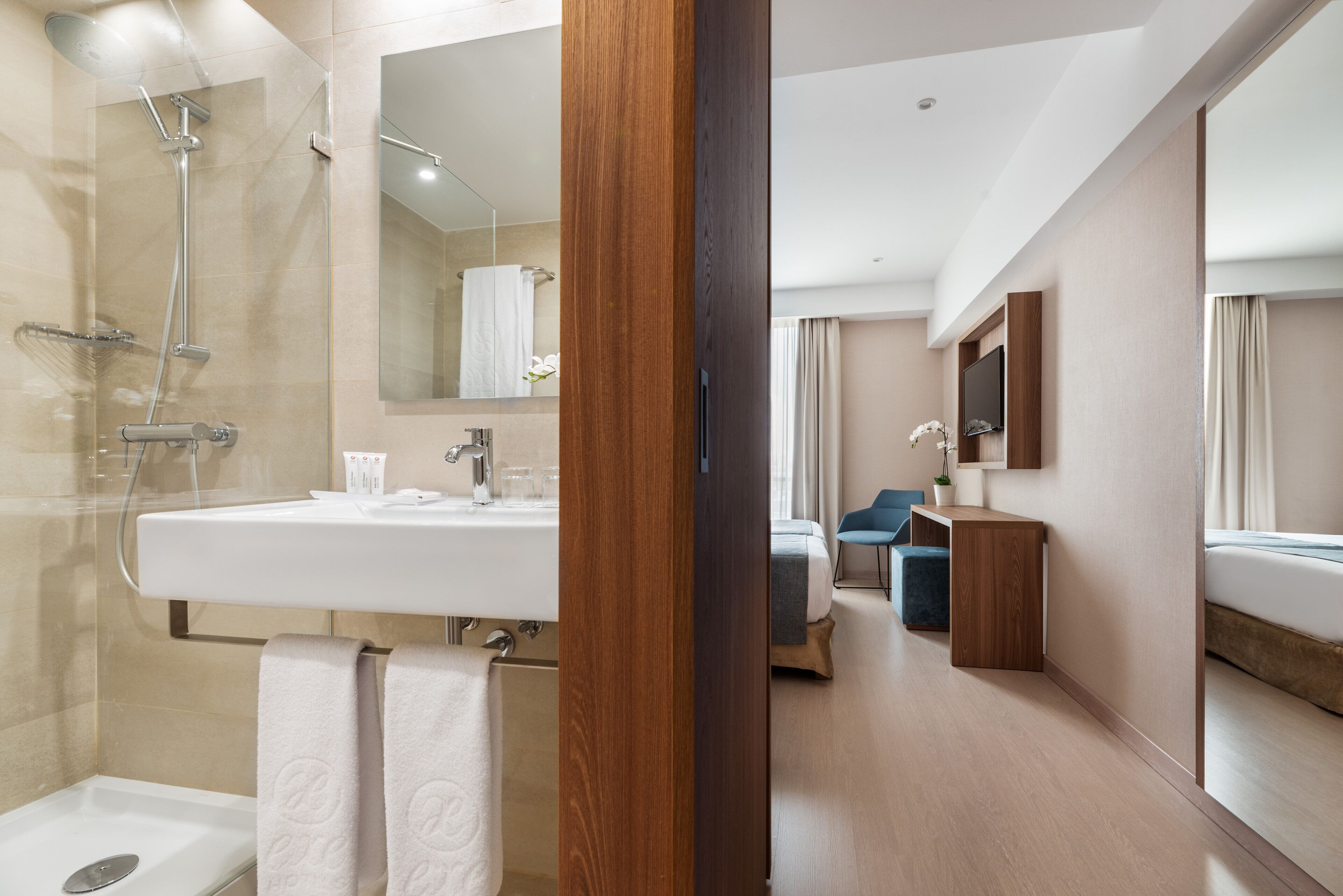 eco-friendly toiletries, hair dryer, towels