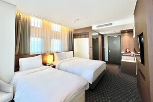 Premium Room, Multiple Beds, Non Smoking | In-room safe, desk, laptop workspace, free WiFi