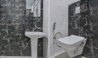 Habitación económica | Baño | Ducha, artículos de higiene personal gratuitos, toallas y jabón