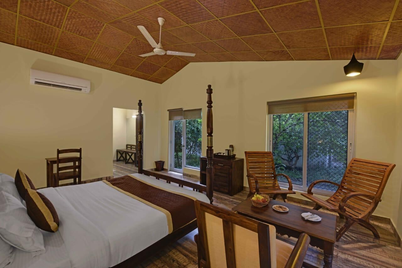 Deluxe Cottage Room | Individually furnished, desk, laptop workspace, bed sheets
