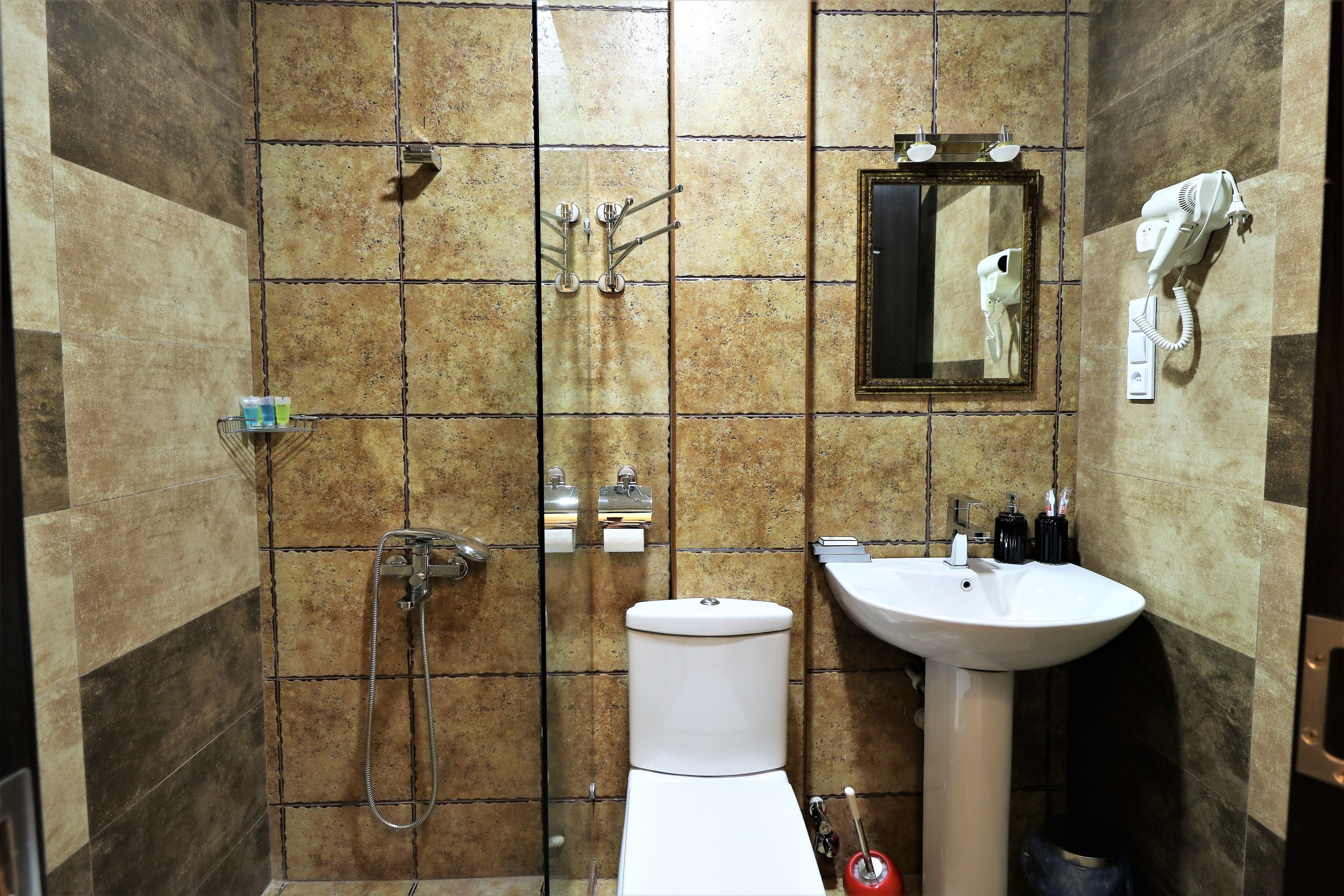 superior room | bathroom | shower, rainfall showerhead, free toiletries, hair dryer
