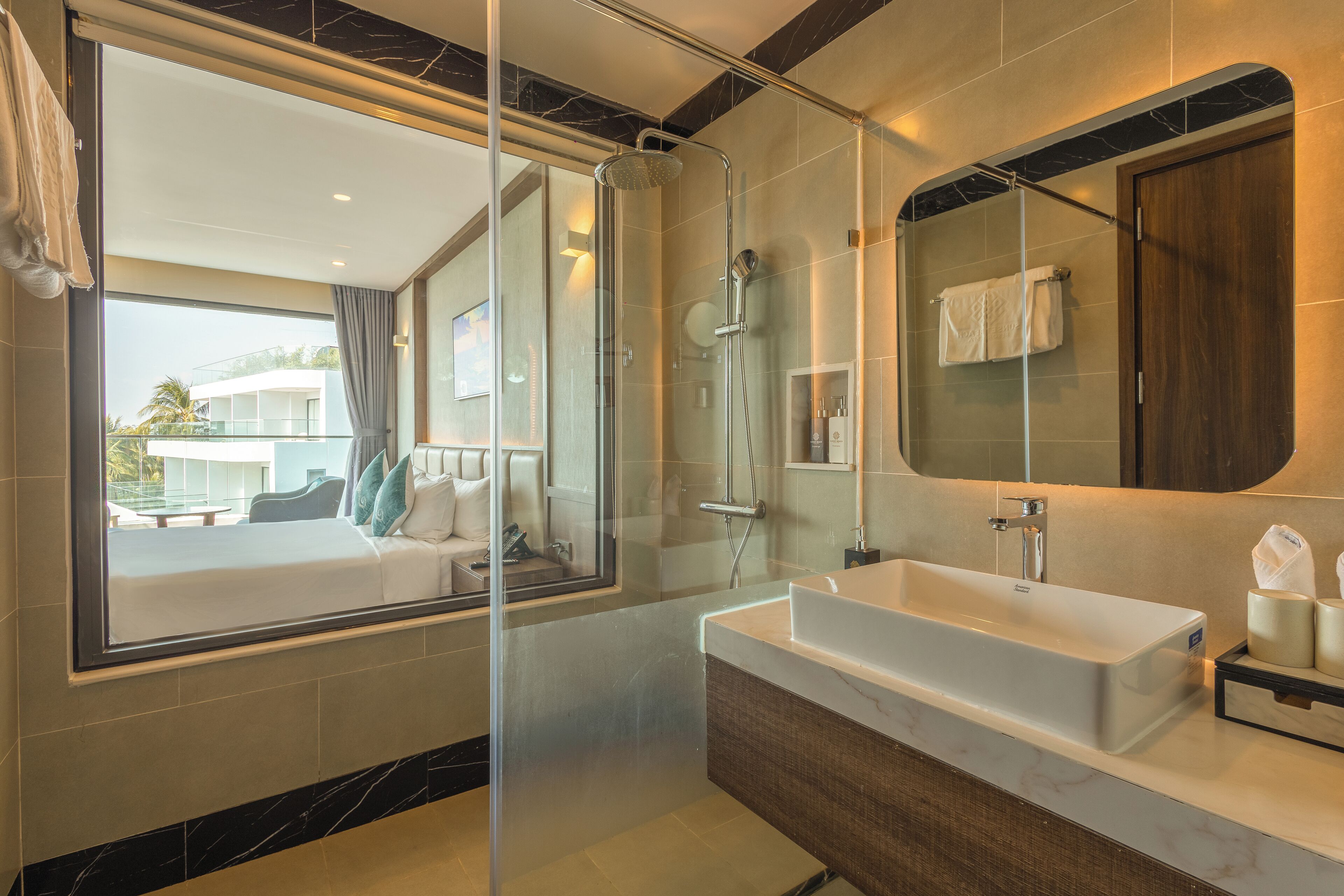 separate bathtub and shower, designer toiletries, hair dryer, bathrobes