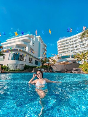 Indoor pool, outdoor pool, sun loungers - Sunset Beach Resort & Spa- Beachfront Pirate Fire Show (Phu Quoc)