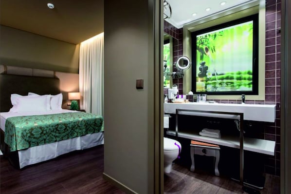 Habitación individual | Ropa de cama de alta calidad, camas con pillow-top y minibar