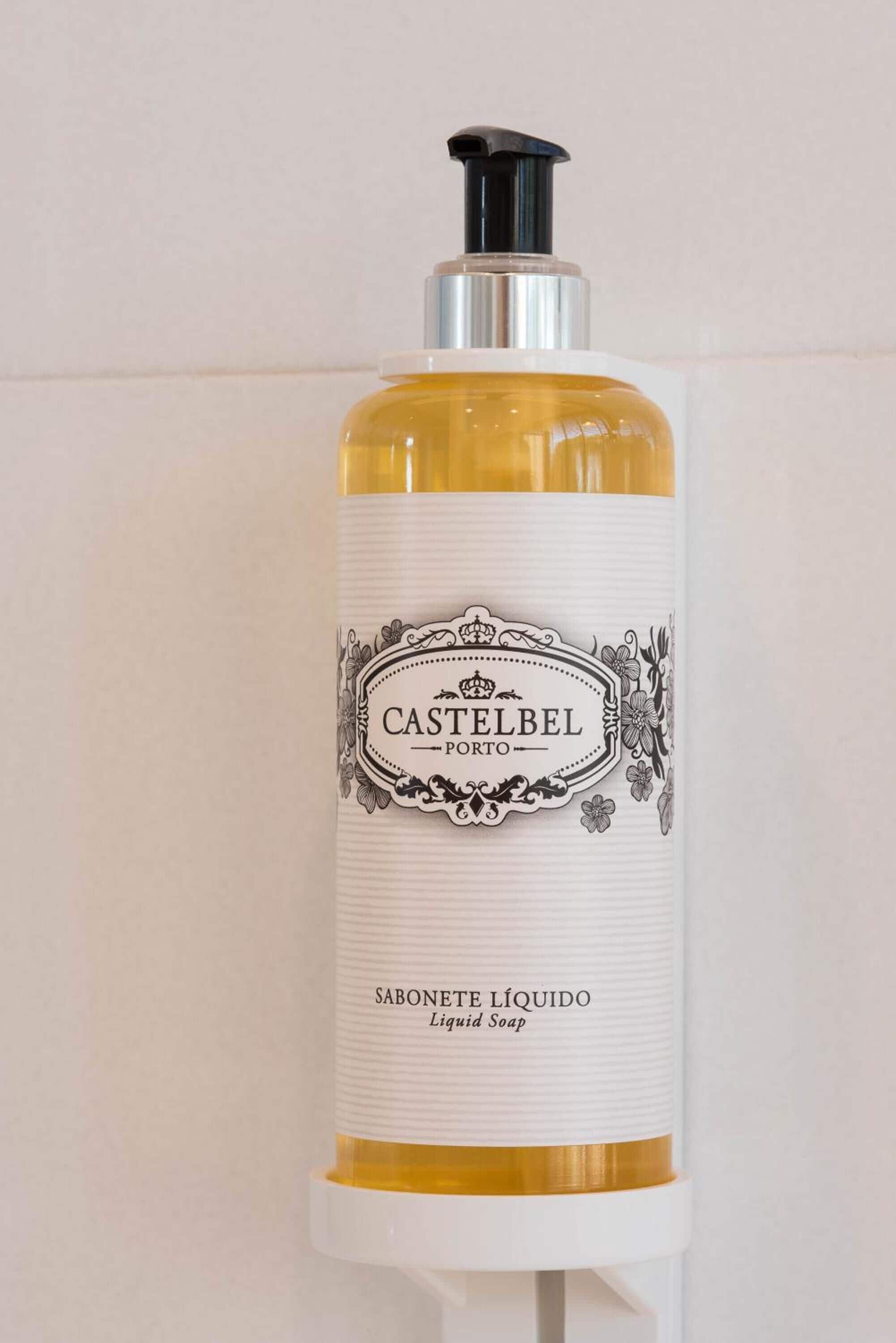 hair dryer, bathrobes, slippers, towels