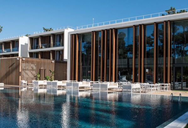 Outdoor pool, pool umbrellas, pool loungers