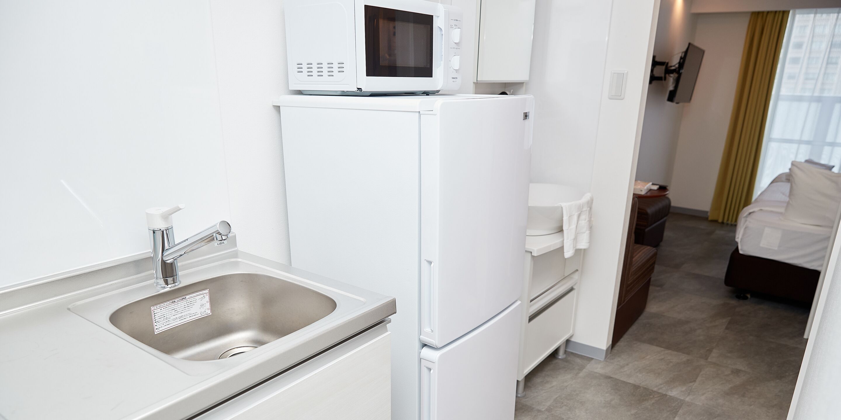 fridge, microwave, stovetop, electric kettle