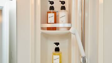 Shower, free toiletries, hair dryer, slippers