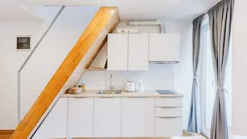 Leilighet, 2 soverom, balkong, fjellutsikt (A3) | Eget kjøkken | Kjøleskap, oppvaskmaskin, vannkoker og høy barnestol