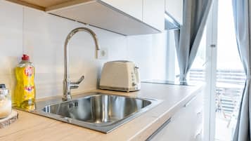 Apartma , balkony, montain view, A3 | Private kitchen | Fridge, stovetop, dishwasher, electric kettle