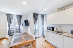 Apartment, Balcony, Mountain View (A2) | Living area | Flat-screen TV, heated floors - Apartmaji Skok (Bovec)