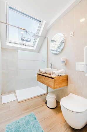 Apartment, Balcony, Mountain View (A1) | Bathroom | Shower, rainfall showerhead, hair dryer, towels - Apartmaji Skok (Bovec)