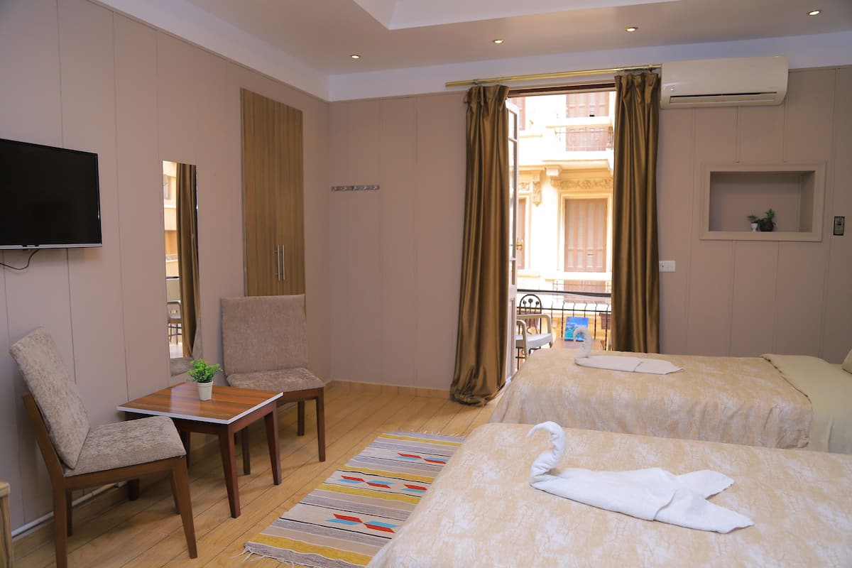 Deluxe Twin Room, Shared Bathroom | Blackout drapes, soundproofing, free WiFi, bed sheets