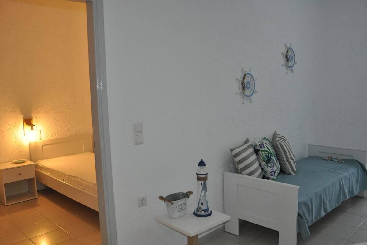 Suite, 2 Bedrooms, Sea View (Split level) | Living area | Flat-screen TV