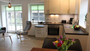 Apartment | Private kitchen | Full-size fridge, oven, stovetop, dishwasher