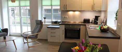 Apartment | Private kitchen | Full-size fridge, oven, stovetop, dishwasher
