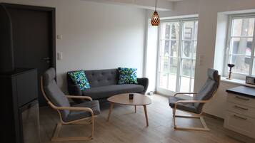 Apartemen | Area keluarga | TV layar datar