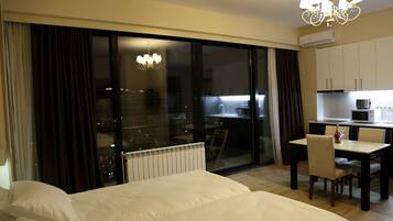 Apartment, 2 Twin Beds, City View (9-02) | 1 bedroom, in-room safe, soundproofing, iron/ironing board