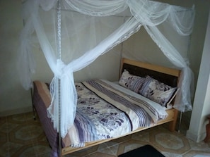 Desk, bed sheets - Gee -Thorn Hotel (Chaka)