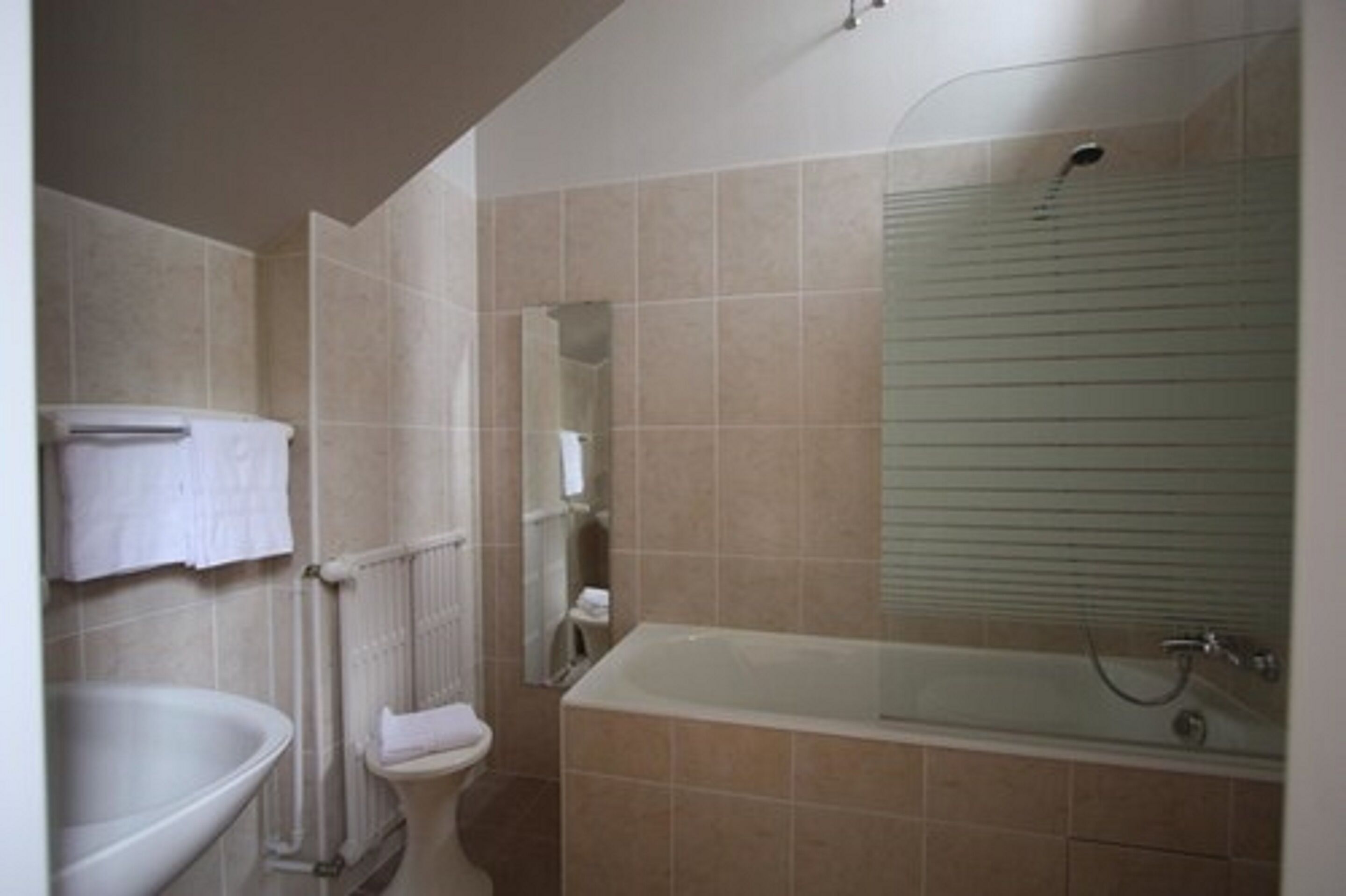 superior double room | bathroom | hair dryer, towels