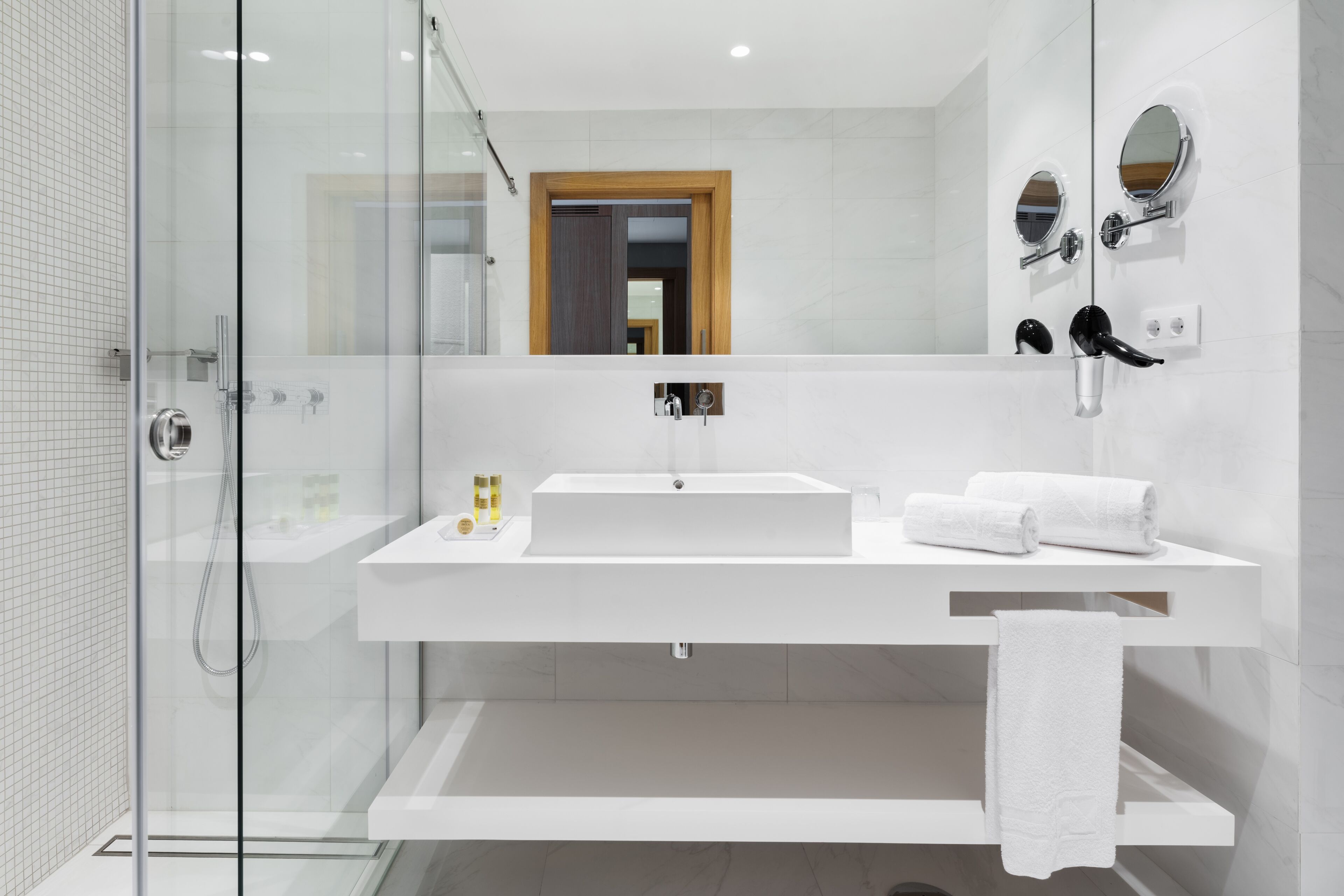 shower, eco-friendly toiletries, hair dryer, slippers