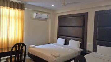 Deluxe Room | In-room safe, blackout curtains, rollaway beds