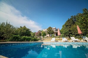 Outdoor pool, pool umbrellas, pool loungers