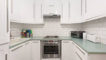 Fridge, microwave, cookware/dishes/utensils