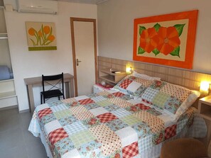 Double Room | Minibar, desk, blackout drapes, iron/ironing board