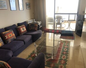 Comfort Apartment, 2 Bedrooms | Living room | 42-inch flat-screen TV with satellite channels, LED TV