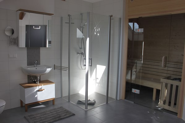 Apartment, 2 Bedrooms, Sauna | Bathroom | Shower, hair dryer, towels, soap