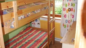 A bunk bed room with a window and a view of the outdoors. - Beara jewel, Simple but complete appartment style property with stunning view. (Kenmare)