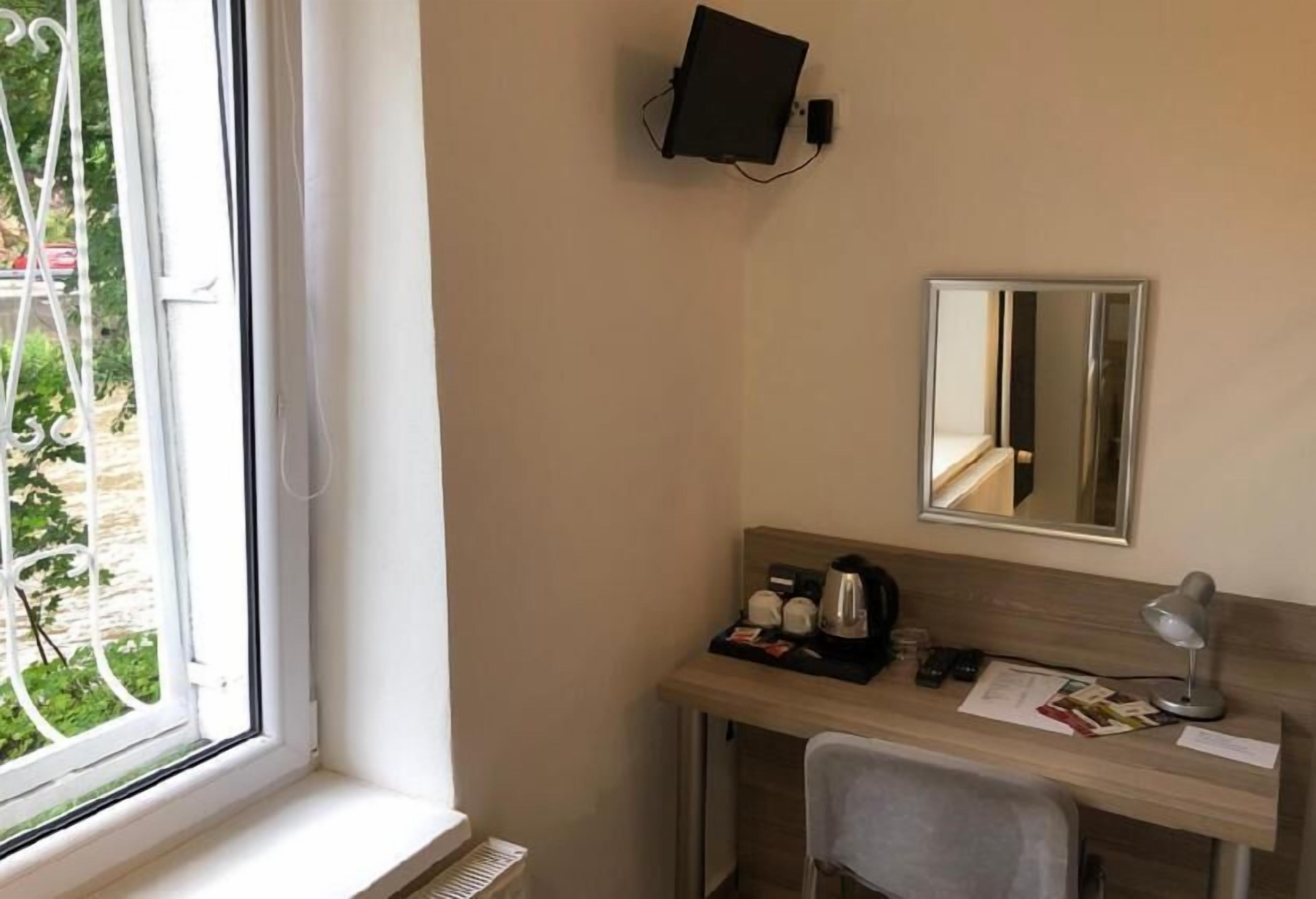 desk, laptop workspace, blackout curtains, free wifi